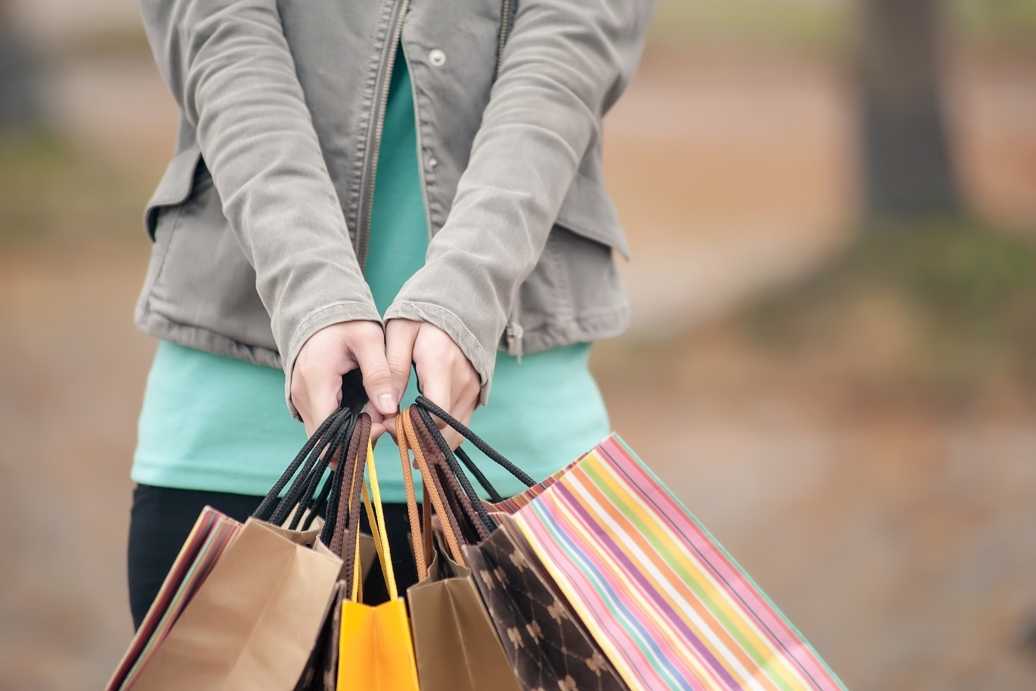 A person holding shopping bags